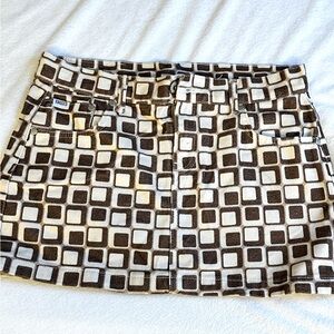 RAGGED jeans—

Denim mini skirt, never worn.